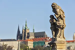 Prints of Statue on Charles Brigde with St. Vitus Cathedral in background in Prague Prague Prints: Statue on Charles Bridge with St. Vitus Cathedral Print