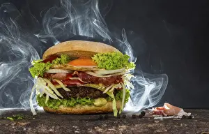 Studio Shot Of Burger Prints: Steaming cheeseburger