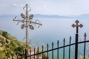 Prints of Steel crucifix and view over Radozhda on Lake Ohrid, Macedonia Macedonia Prints: Steel Crucifix and View over Radozhda, Lake Ohrid Print