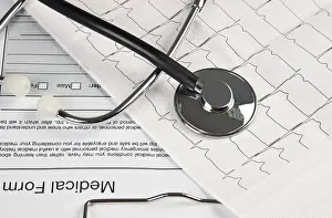 Healthcare Diagnostic Tools Prints: Stethoscope on the chart electrocardiogram