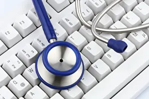 Deserted Computer Setup Prints: A stethoscope on a computer keyboard