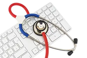 Healthcare System Concept Image Prints: Stethoscope and keyboard of a computer