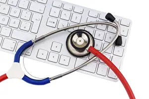 Austria Healthcare System Prints: Stethoscope and keyboard of a computer