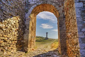 Historic Building Structure Prints: Stone arch with view of a path and ancient column in the background