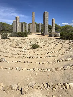 Balearic Islands Monument Prints: Stone column formation and circular patterns in arid landscape