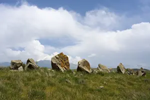 Zorats Karer Megaliths Prints: Stone formations in a meadow under a cloudy sky