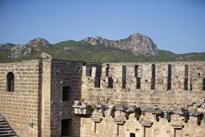 Stone Wall Architecture Prints: Part of the stone wall of the ancient amphitheater with architectural elements
