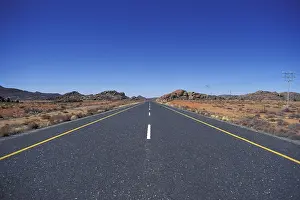 Desert Road Prints: Straight Road in Namibia