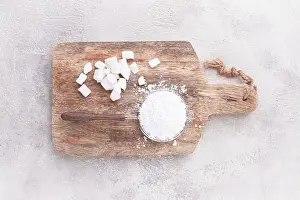 Sweet Dessert Ingredients Prints: A strainer with powdered sugar