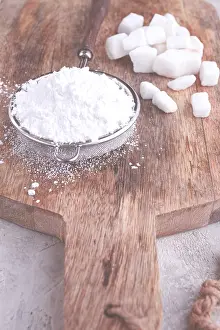 Kitchen Utensil Food Photography Prints: A strainer with powdered sugar