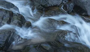 Nature Photography Europe Prints: A stream that flows over rocks and creates a soft