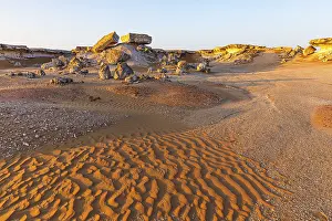 Arabian Peninsula Cliffs Prints: Striking cliffs surrounded by windswept sand structures
