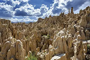 Prints of Structured rocks against dramatic cloud formations in the sky, the Valle de la Luna Moon Valley near La Paz in Bolivia Bolivia Prints: Valle de la Luna Moon Valley Print, Bolivia