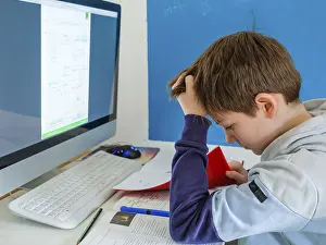 Childhood Education Prints: Students doing homework in front of the computer