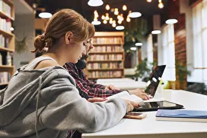 Educational Institution Prints: Students learning in university library