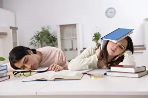 One Person Studying Prints: Students preparing for exam together at home