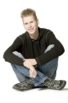 White Background Male Model Prints: Studio portrait of a young man smiling