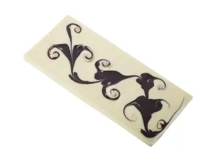 Studio Shot Dessert Prints: Studio shot of white chocolate bar with pattern