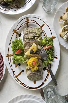 Gastronomy Meal Prints: Stuffed fish on the table in the restaurant