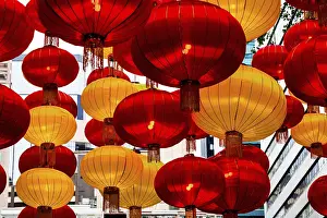 Asian Culture Prints: A stunning array of red and yellow lanterns brightly illuminated