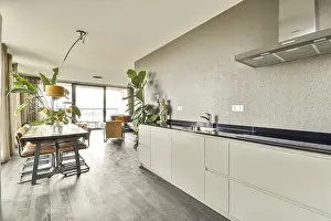Scandinavian Interior Design Prints: A stylish dining area featuring a sleek table