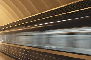 Rail Traffic Movement Prints: Subway platform with moving fast train