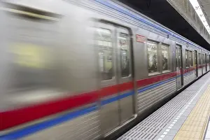 Deserted Subway Station Prints: Subway train going through the station