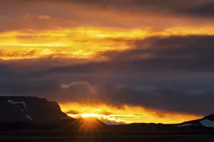 Backlit Mountain View Prints: Sun breaking through the clouds