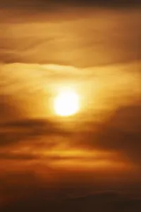 Uninhabited Evening Skies Prints: Sun behind cloud cover, sunset