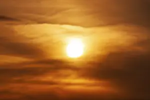 Overcast Evening Atmosphere Prints: Sun behind cloud cover, sunset