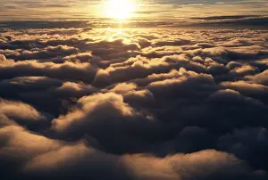 Blue Skies Photography Prints: Sun above the clouds