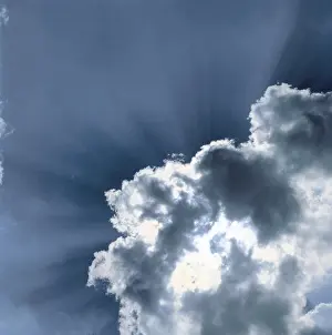 Cloudy Skies Photography Prints: Sun behind clouds
