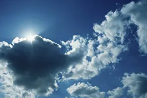 Cloud Formations In The Sky Prints: Sun behind clouds