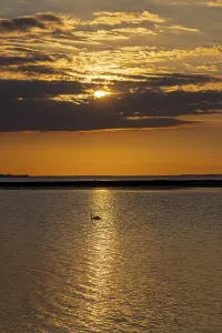 Northern German Nature Reserve Prints: Sun behind clouds, sunset, reflection