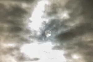 Cloudy Weather Photography Prints: Sun behind dark clouds