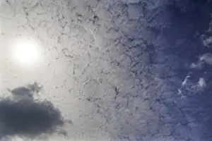 Cirrocumulus Cloud Formation Prints: Sun hidden by slight cloud cover