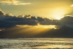 French Overseas Territory Landscapes Prints: Sun rays breakig through the clouds over Moorea