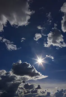 Fine Weather Conditions Prints: Sun shines between cumulus clouds
