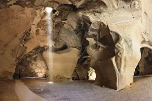 Raw Material Extraction Site Prints: Sunbeam in the ceiling illuminates the vaults of the cave