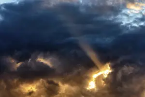 Orkney Islands Scotland Prints: Sunbeam through gap in clouds, dramatic evening sky