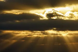 Sunbeams Through Clouds Prints: Sunbeams shining through clouds
