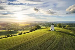 Devon Landscape Prints: Sunnset over Devon Windmill over Fields and Farms