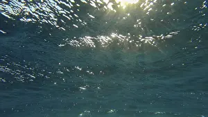 North African Evening Sky Prints: Sunrays penetrate through the surface of the water