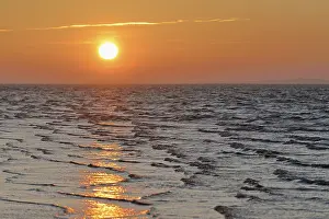 German North Sea Island Prints: Sunrise on the beach with rising waves