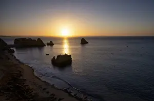 Morning Light On Rocky Shore Prints: Sunrise on the beach, rocks, cliffs