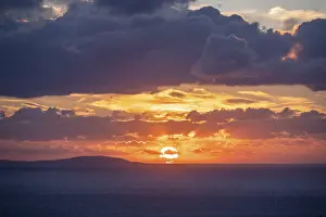 Cloudy Sky Greece Prints: Sunrise behind the clouds, atmospheric dramatic cloudy sky