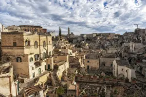 Prints of Sunrise light over Sassi in Matera. Iconic vast areas of cave dwellings along narrow alleyways. Famous tourist attraction captured in Matera, Italy Basilicata Prints: Matera Sunrise Print - Cave Dwellings in Italy