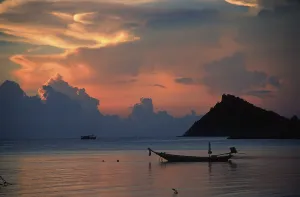 Sunset Over The Ocean Prints: Sunset boat clouds