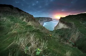 Atmospheric Landscape Photography Prints: Sunset over cliffs in ocean, Etretat