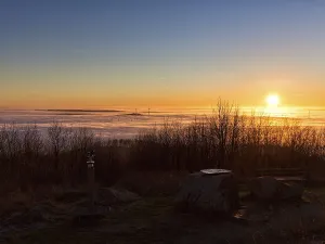Deserted Mountain Top Scene Prints: Sunset over cloud cover on mountain top